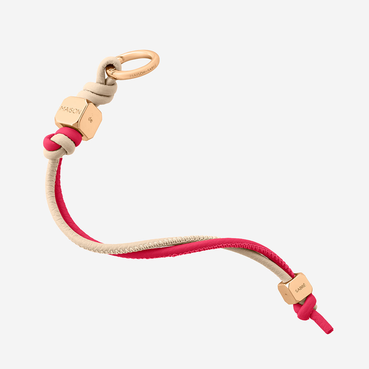 The Wristlet Charm - Saharan Fuchsia – MAISON de SABRÉ