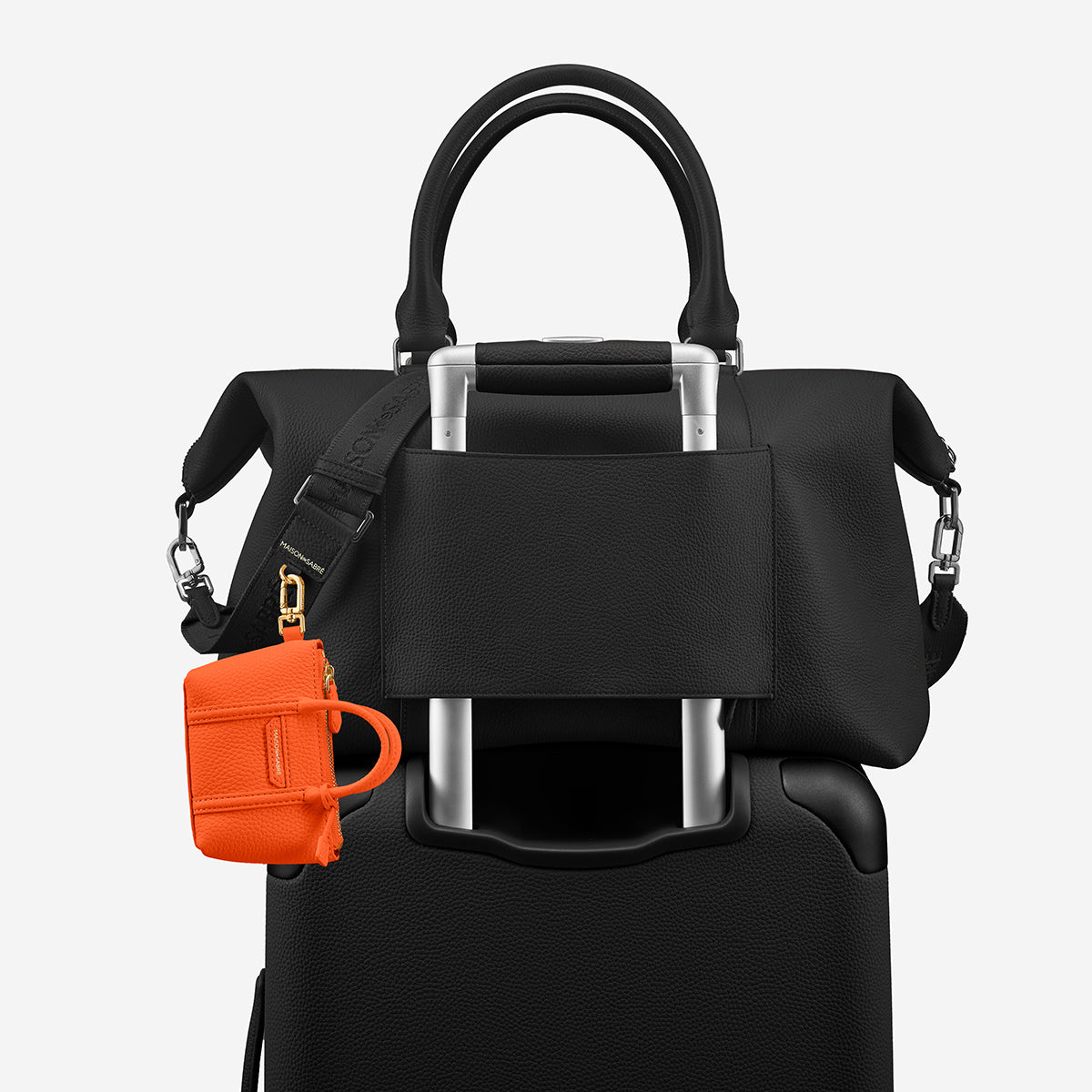 The SABRÉMOJI™ Weekender Charm - Manhattan Orange